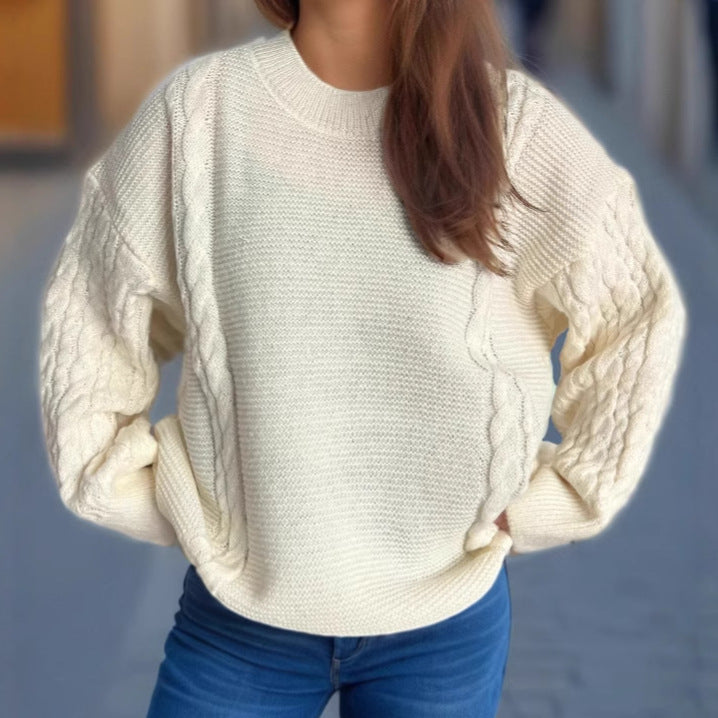 Kvinne chunky strikkegenser med kabeldesign og voluminøse ermer Skjora