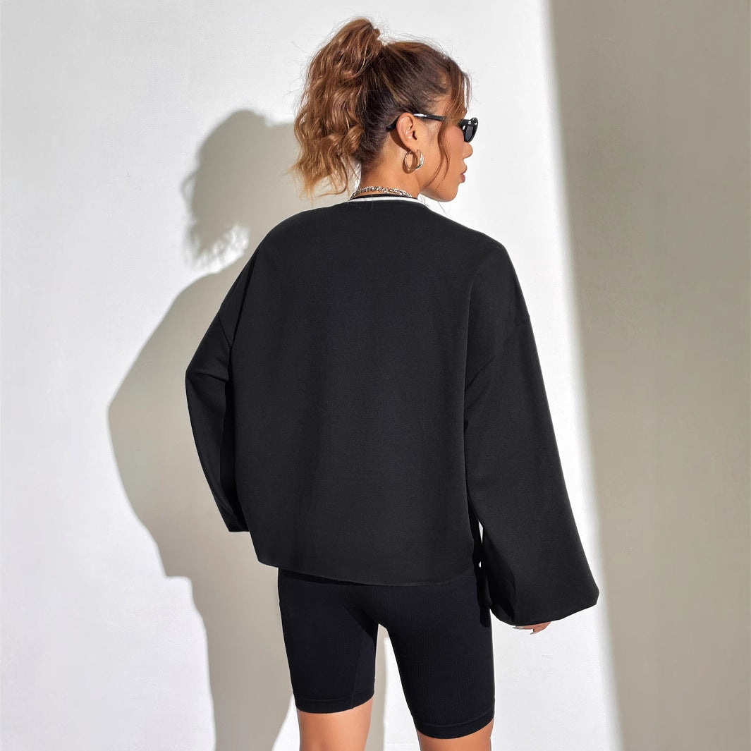 Dames uformell oversized hettegenser med V-hals og grafisk trykk Skjora