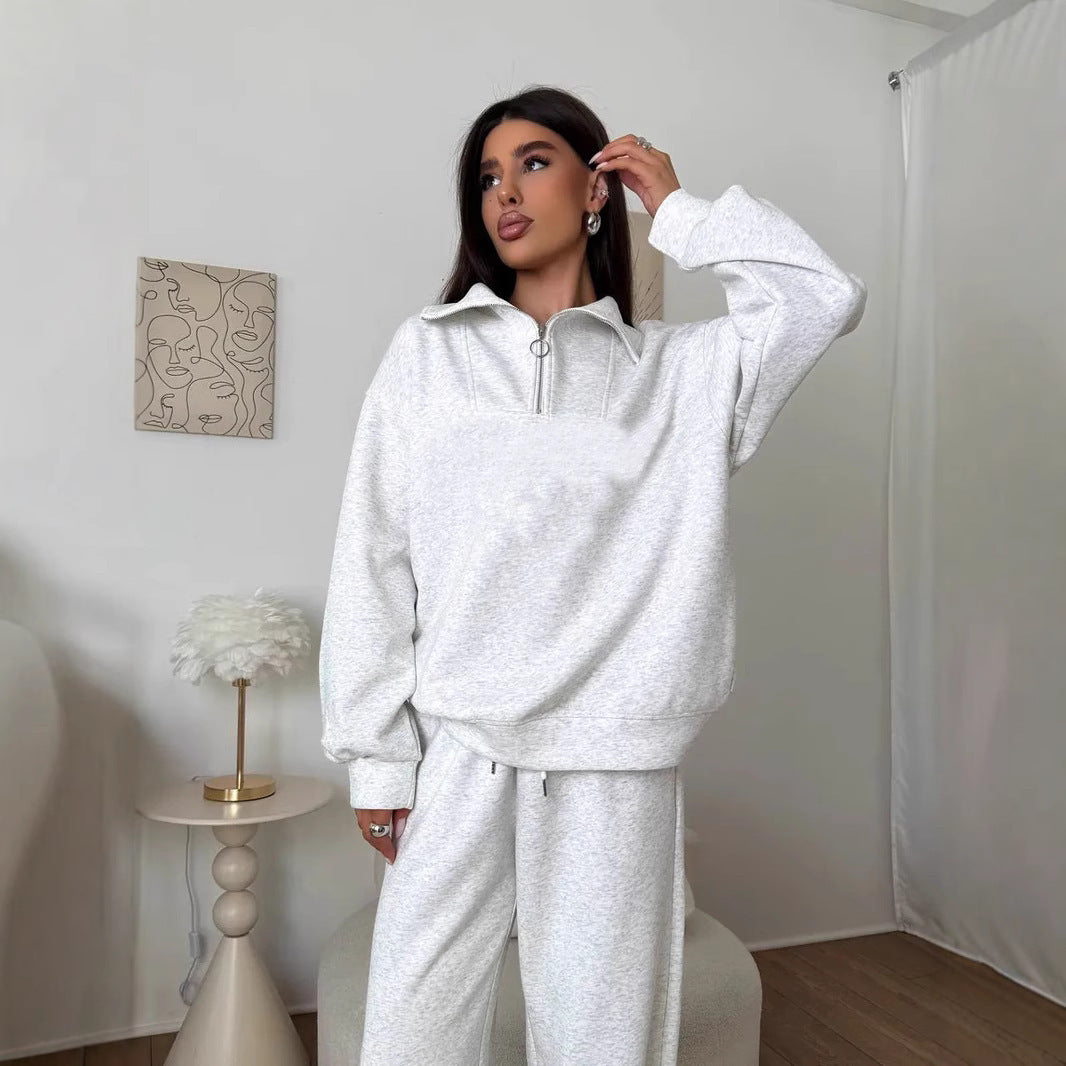 Kvinnens elegante fleece treningsoverall med høy krage og praktisk glidelås