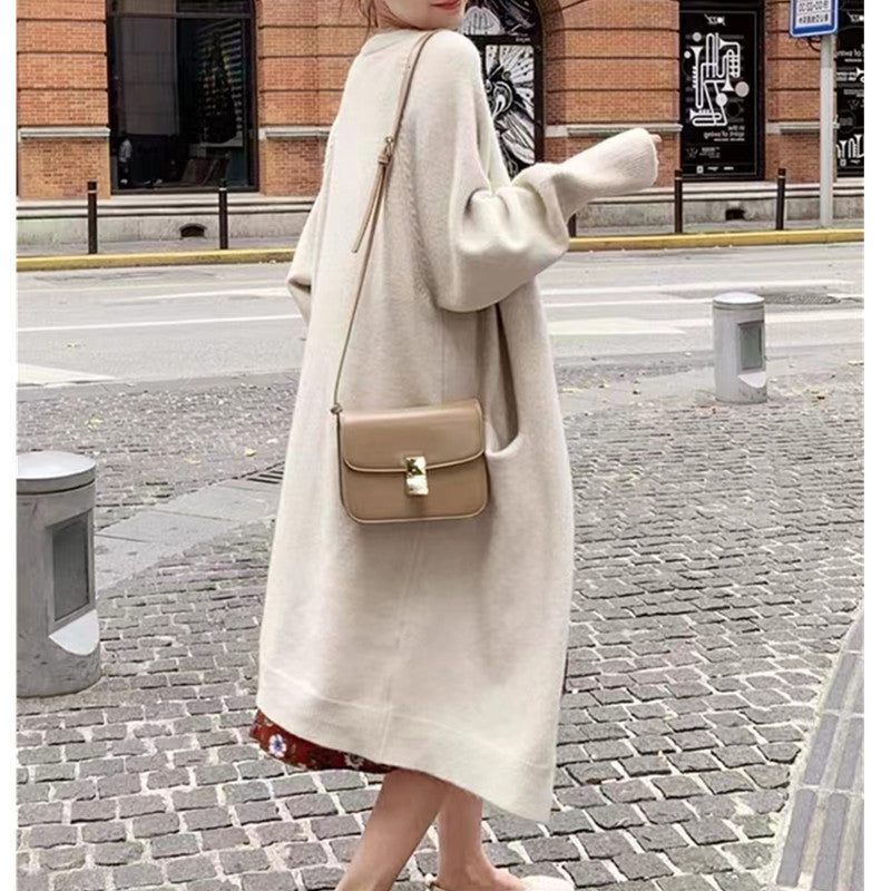 Dame oversized strikket jakke med lommer og avslappet passform Skjora