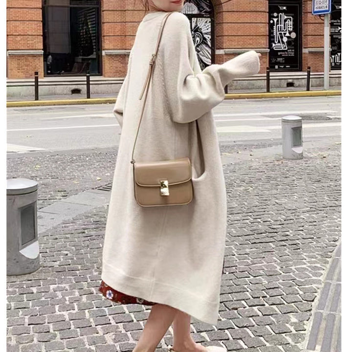 Dame oversized strikket jakke med lommer og avslappet passform Skjora