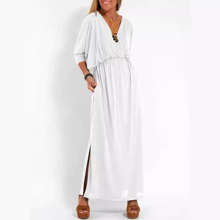 Kvinne elegant maxi kjole med sidesplit og fleksibel midje Skjora