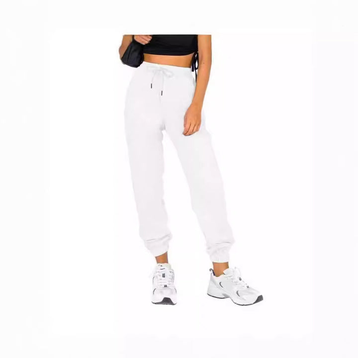 Kvinne sporty joggebukser med praktisk snor og elastisk liv.