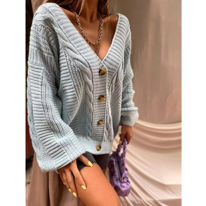 Kvinnens chunky strikk cardigan med store knapper og voluminøse ermer Skjora