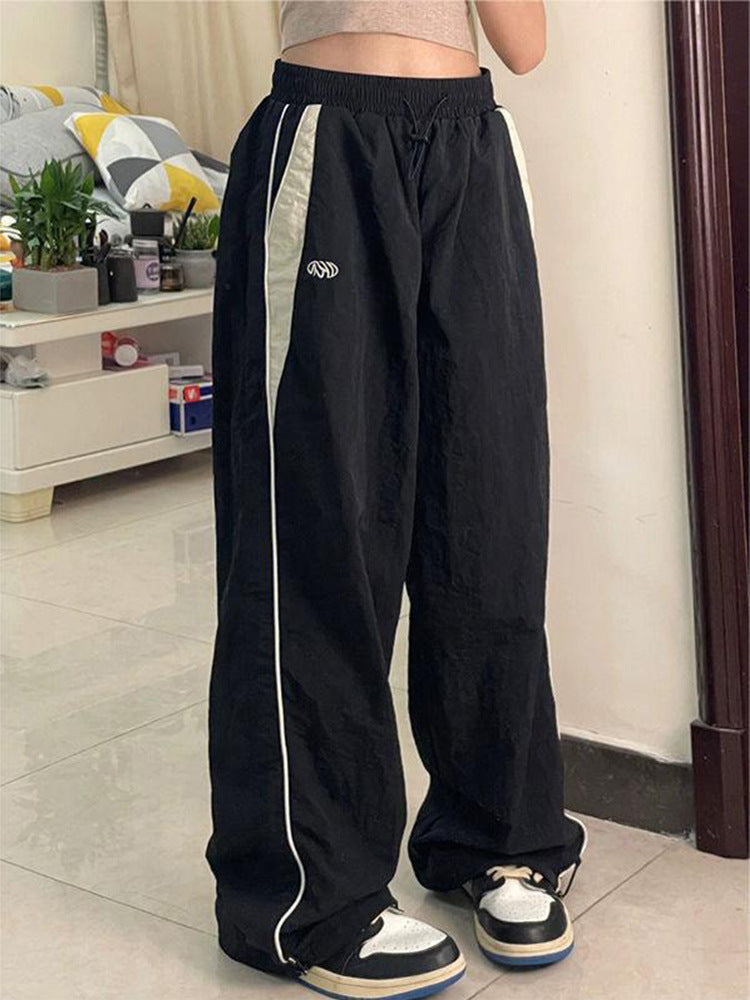 Dame loose fritid bukser med elastisk midjebånd og sidelommer med glidelås Skjora
