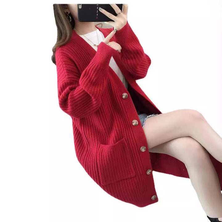 Dame cardigan med lappelommer og knappestolpe Skjora