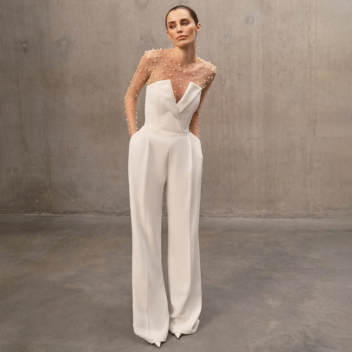 Damer elegant jumpsuit med transparente ermer og perlepynt Skjora