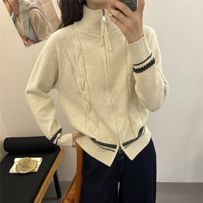 Kvinne cardigan med elegant glidelås og teksturert kabelmønster Skjora