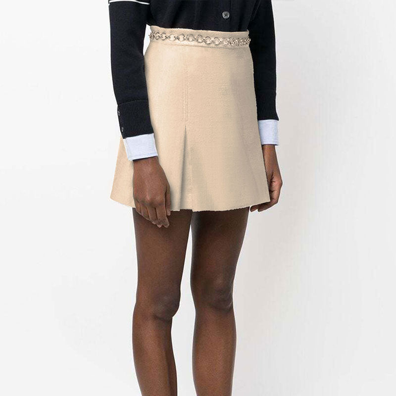 Dame elegant miniskjørt med gullkjedet Skjora