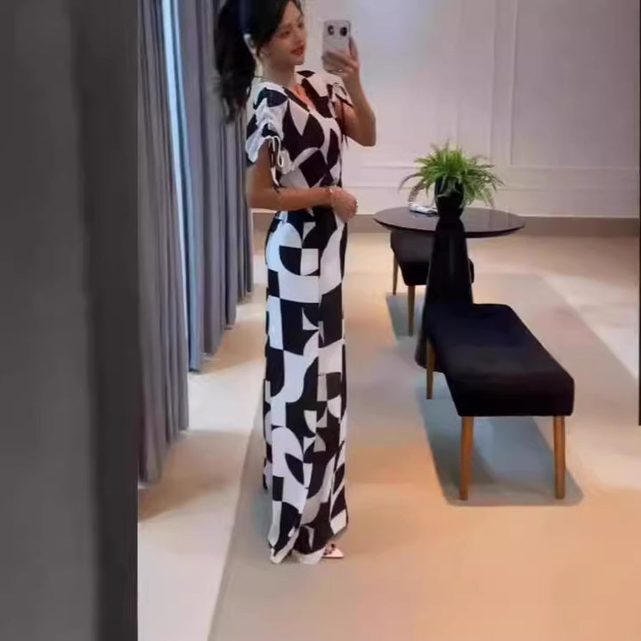 Damer Moderne Jumpsuit med grafisk mønster og elegante ermer Skjora