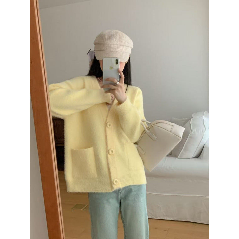 Kvinnes Fluffy Knappe Cardigan med Elegante Lommer Skjora