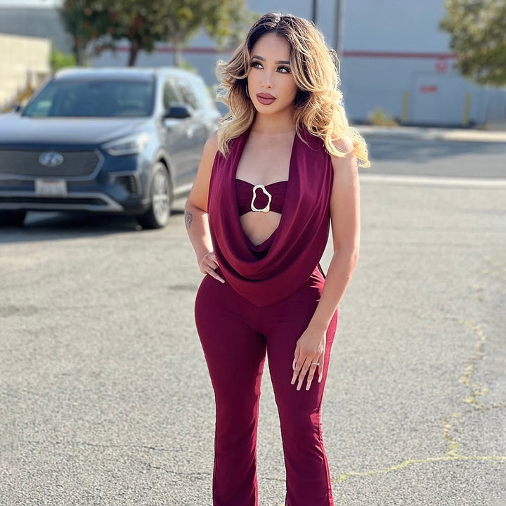 Dame Elegant jumpsuit med justerbar utringning og smart belte Skjora