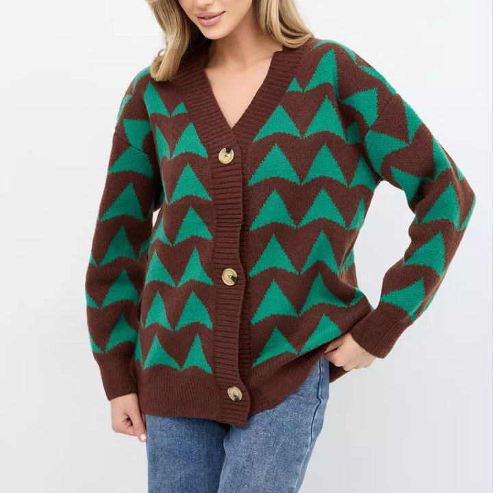 Kvinne cardigan med moderne bølgemønster og gullknapper Skjora