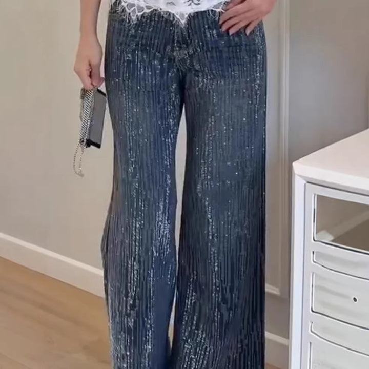 Kvinnelig glitrende vid-cut jeans med elegant tekstur Skjora