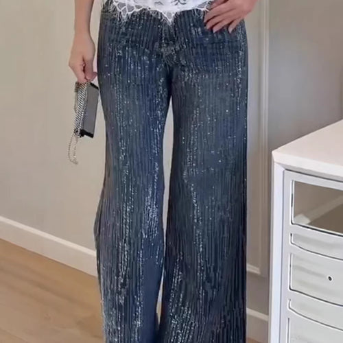 Kvinnelig glitrende vid-cut jeans med elegant tekstur Skjora