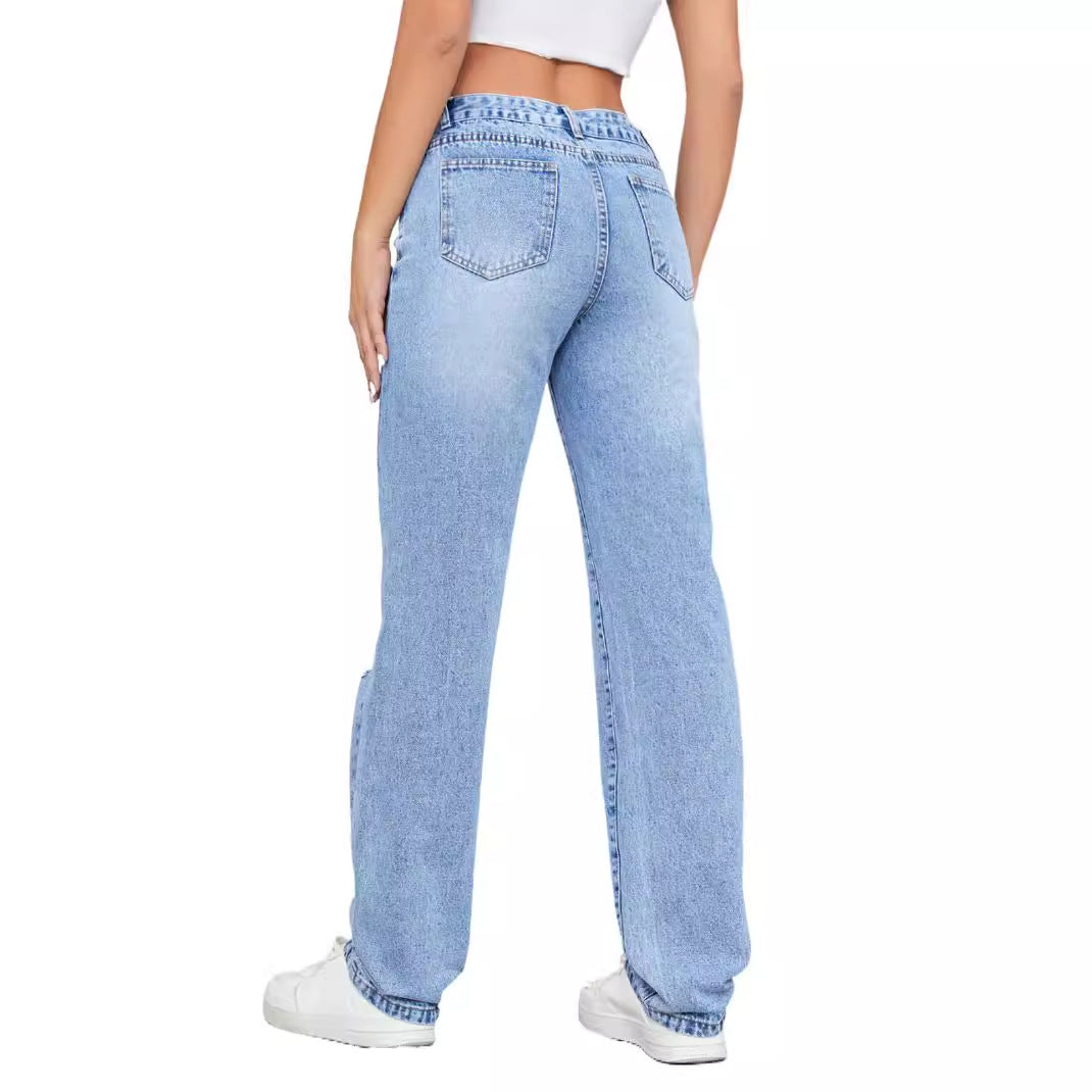 Kvinnenes høye jeans i en avslappet vintage-stil med en stilfull ødelagt effekt Skjora