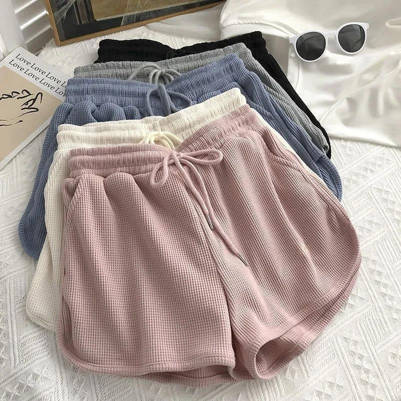 Kvinnelige casual shorts med vaffelstruktur og justerbar snorlås og elastisk midjebånd