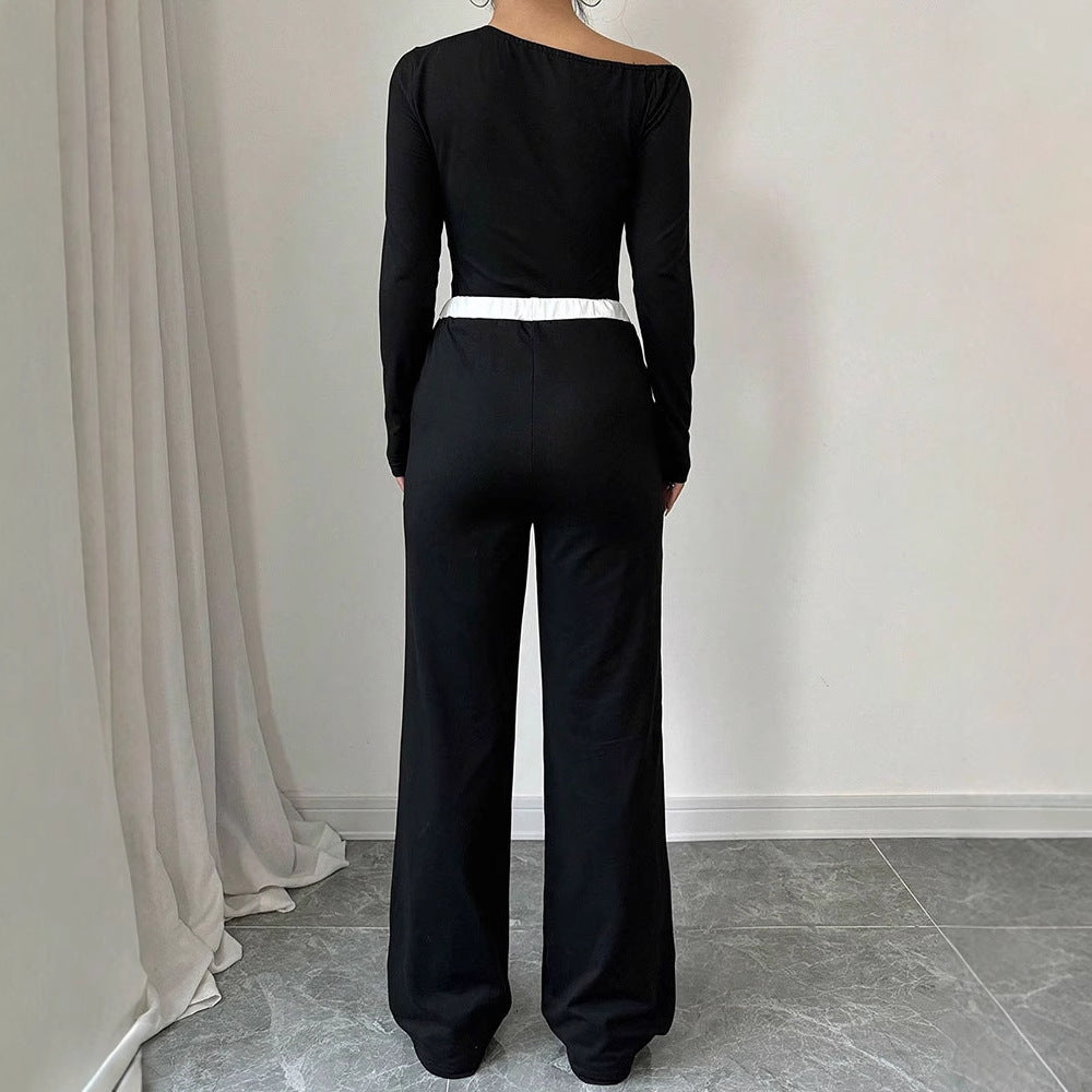 Damer Elegant jumpsuit med asymmetrisk topp og vide ben Skjora