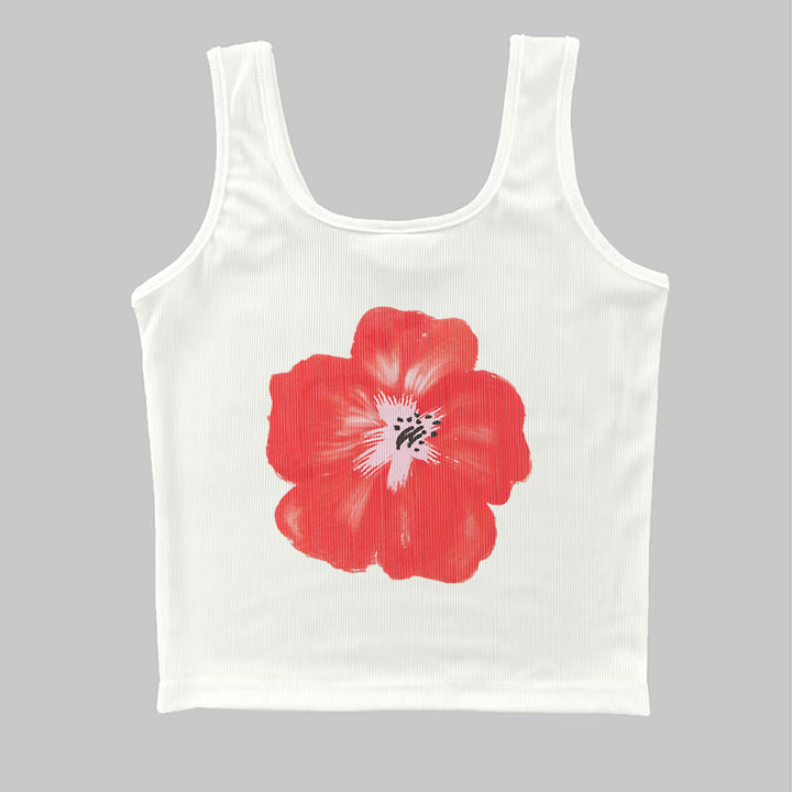 Damer ermeløs topp med blomsterlig hibiskus-motiv Skjora