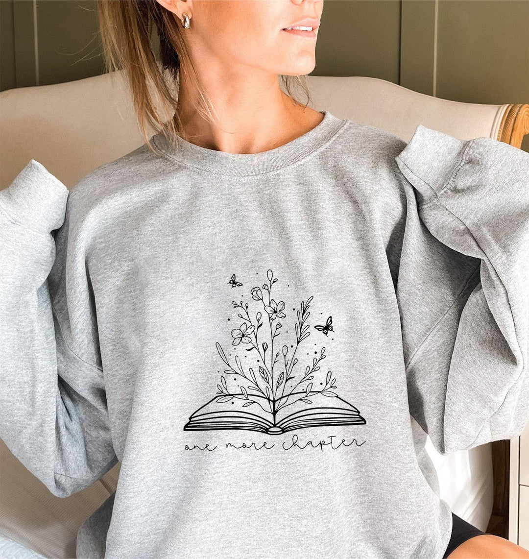 Kvinne genser med elegant blomst design og inspirerende trykk Skjora