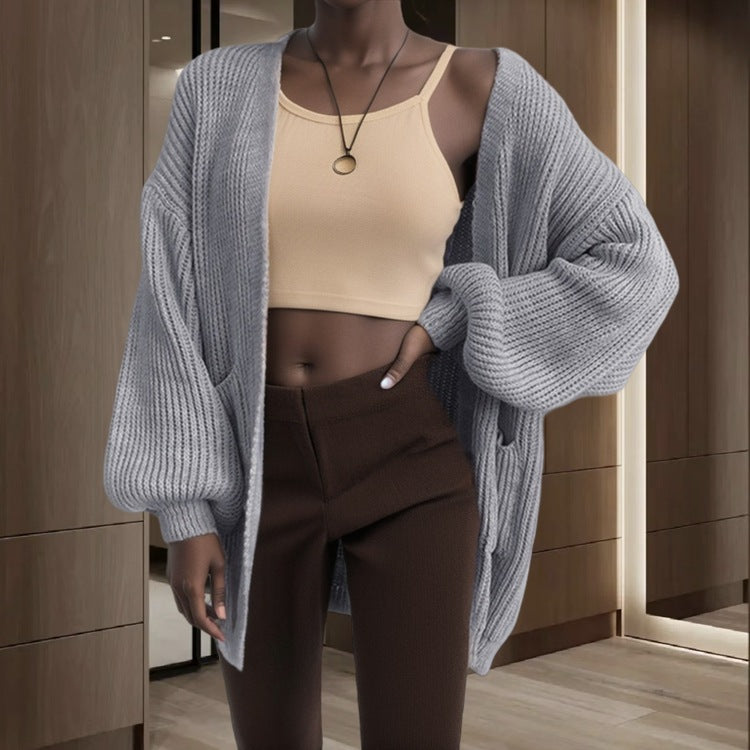 Damer chunky strikket cardigan med voluminøse ermer og praktiske lommer Skjora