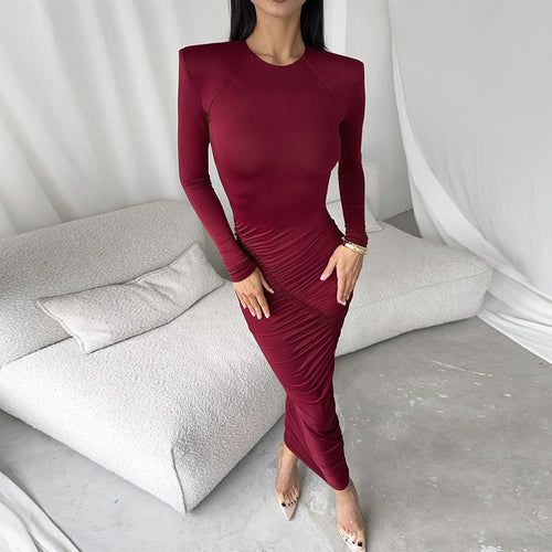 Kvinnenes langermede samlet kjole med elegant snitt og figurskapende detaljer