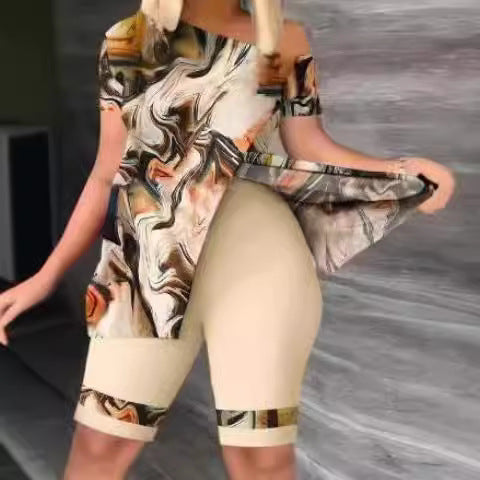 Women's sporty top with stylish asymmetrical cut and figure-flattering shorts Skjora