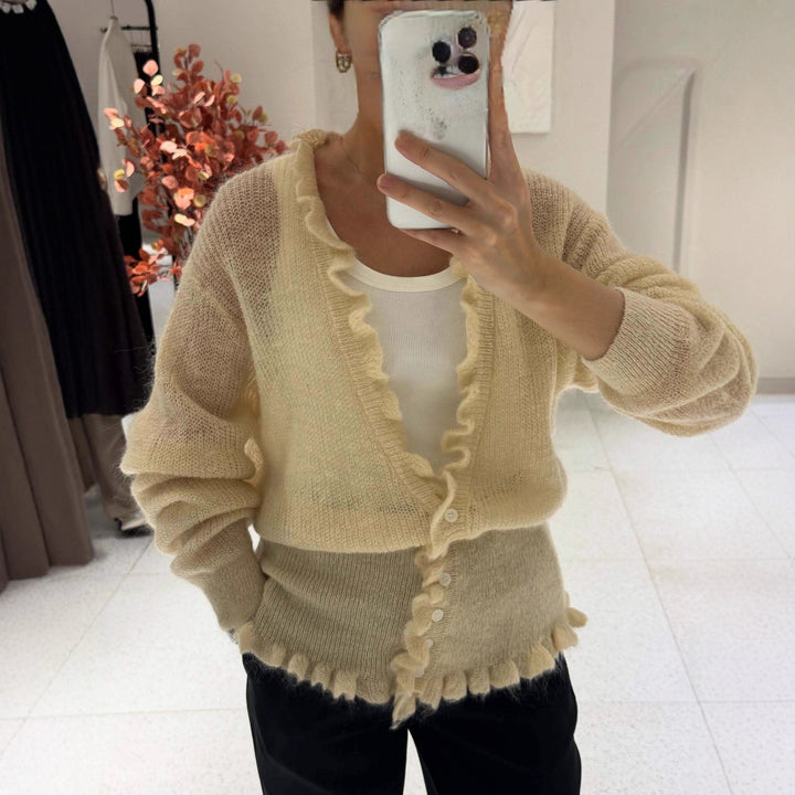 Dame cardigan med lekent volangdesign Skjora