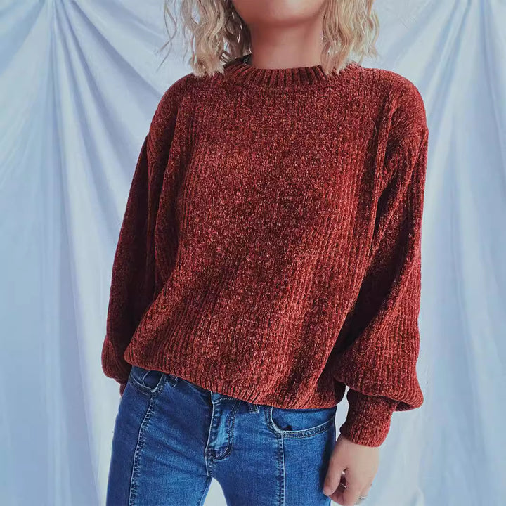 Kvinnens koselige chunky strikkegenser med brede ermer og teksturert design Skjora