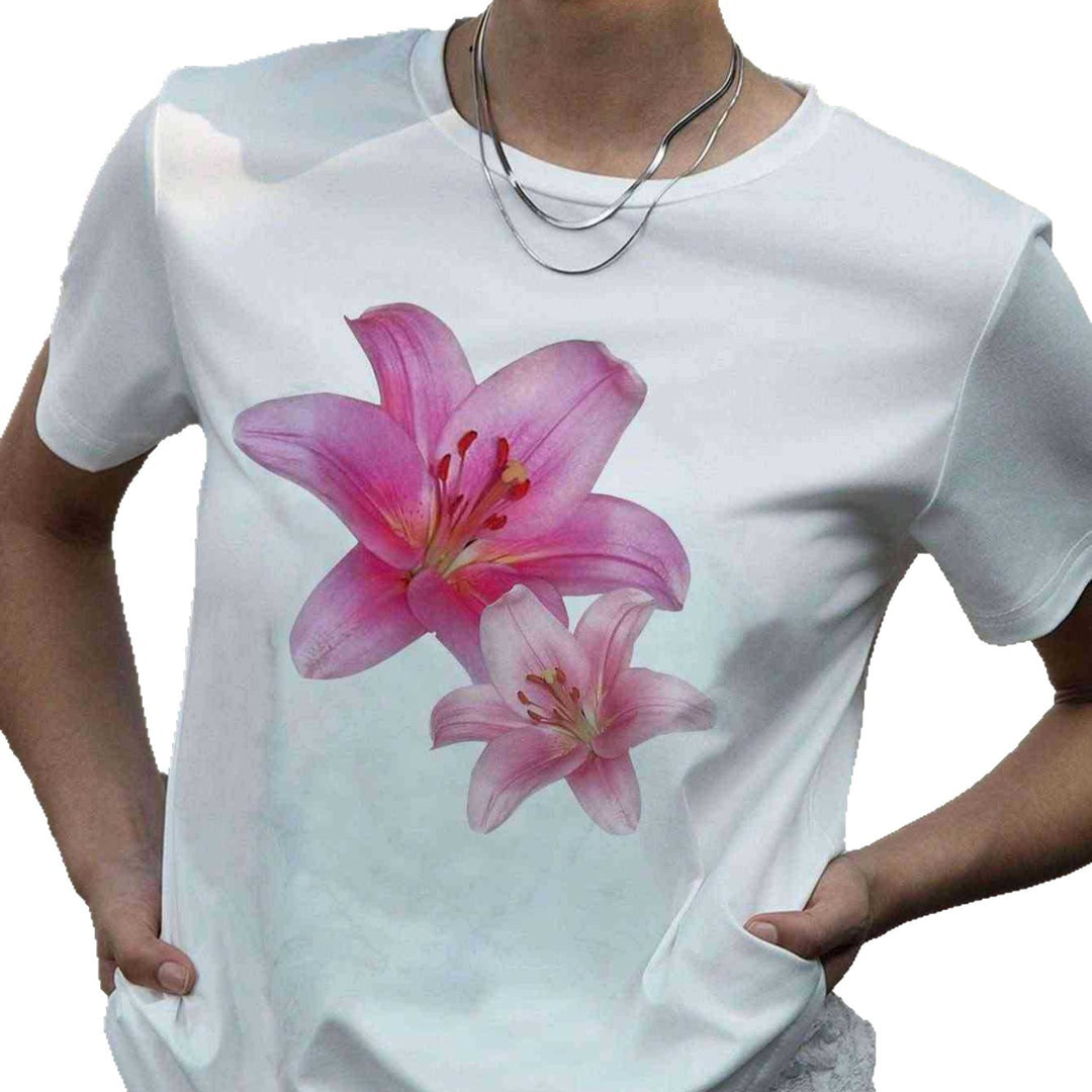 Dame T-skjorte med blomstermotiv og komfortskjæring Skjora