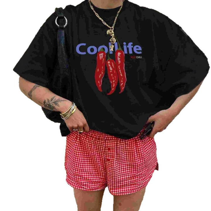Damer oversized T-skjorte med kreativt chili-motiv og avslappet snitt Skjora