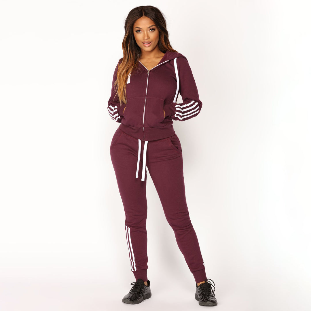 Dame sporty fleece joggedress med sidestriper Skjora