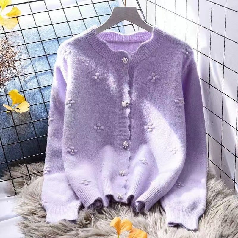 Kvinnenes koselige cardigan med blomsterapplikasjoner Skjora