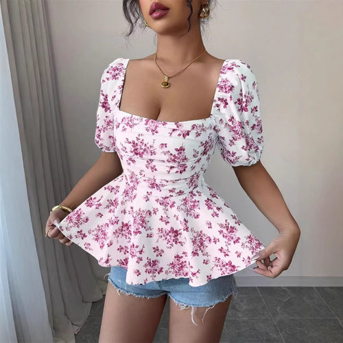 Dame Peplum-bluse med pufferm og blomstermønster Skjora