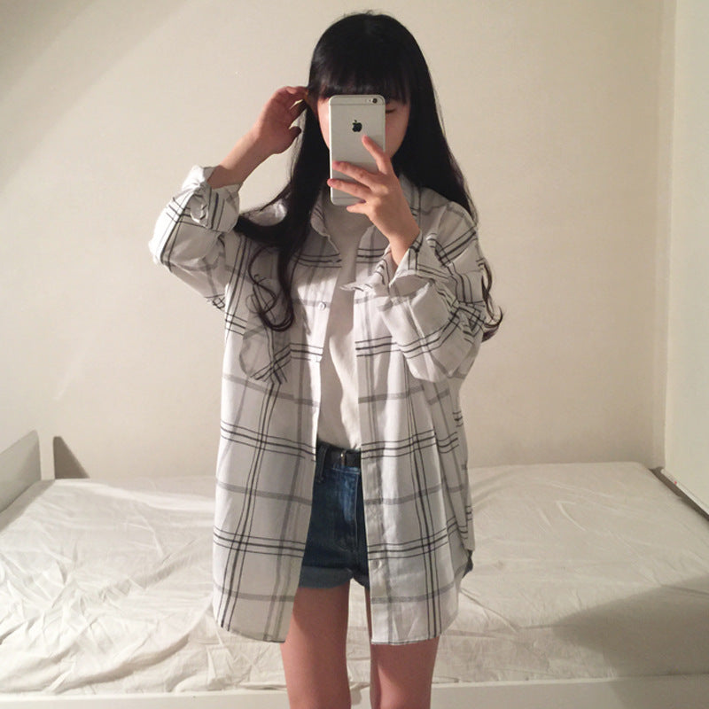 Dame stripete overskjorte bluse i en avslappet fasong med oversized ermer
