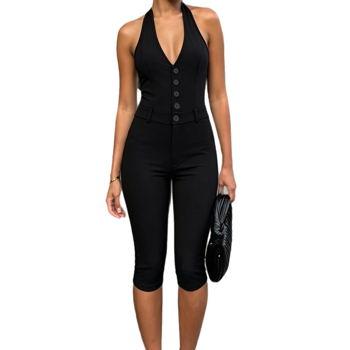 Dame jumpsuit med dyp V-hals og elegant knappdetalj Skjora
