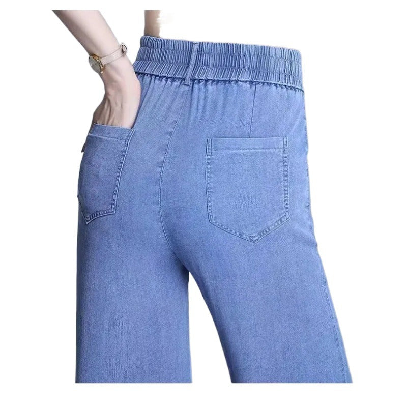 Kvinne Loose Jeans med Elastisk Liv og Praktiske Lommer Skjora
