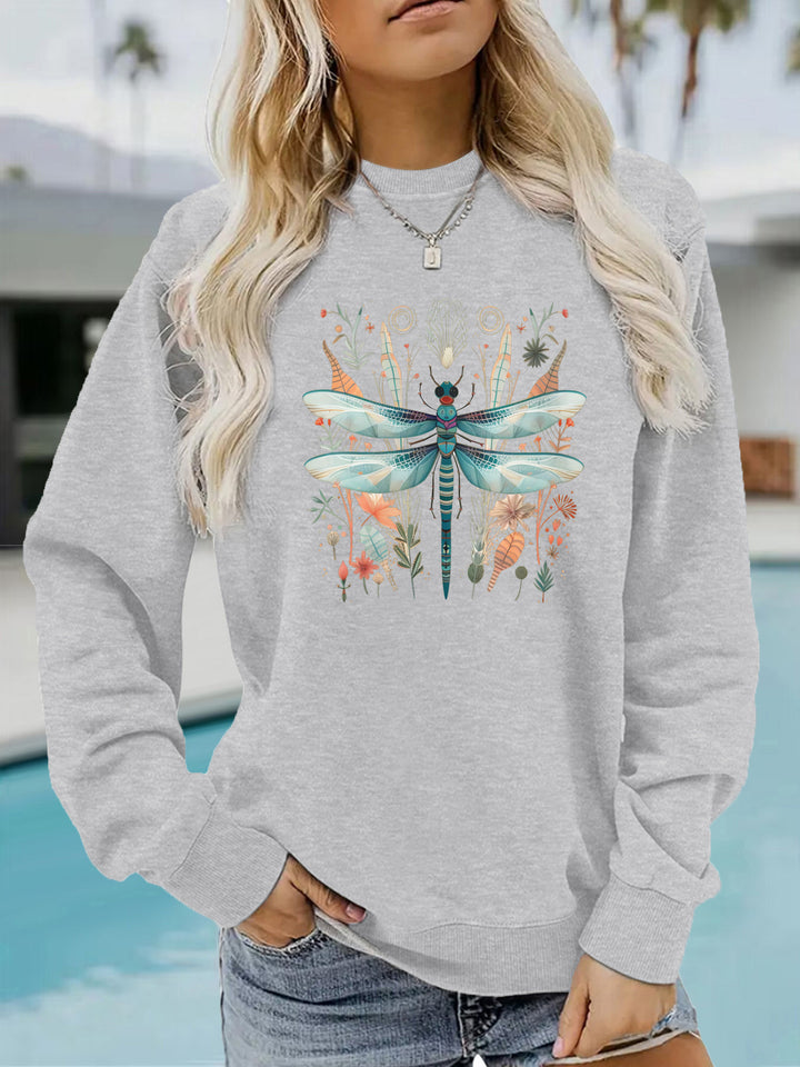 Kvinnegenser med unikt libelletrykk og botanisk design Skjora