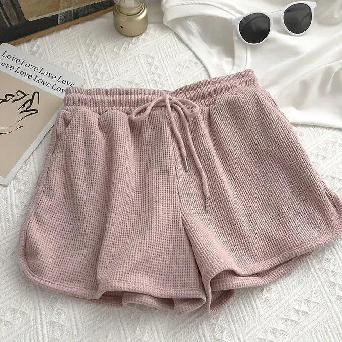 Kvinnelige casual shorts med vaffelstruktur og justerbar snorlås og elastisk midjebånd