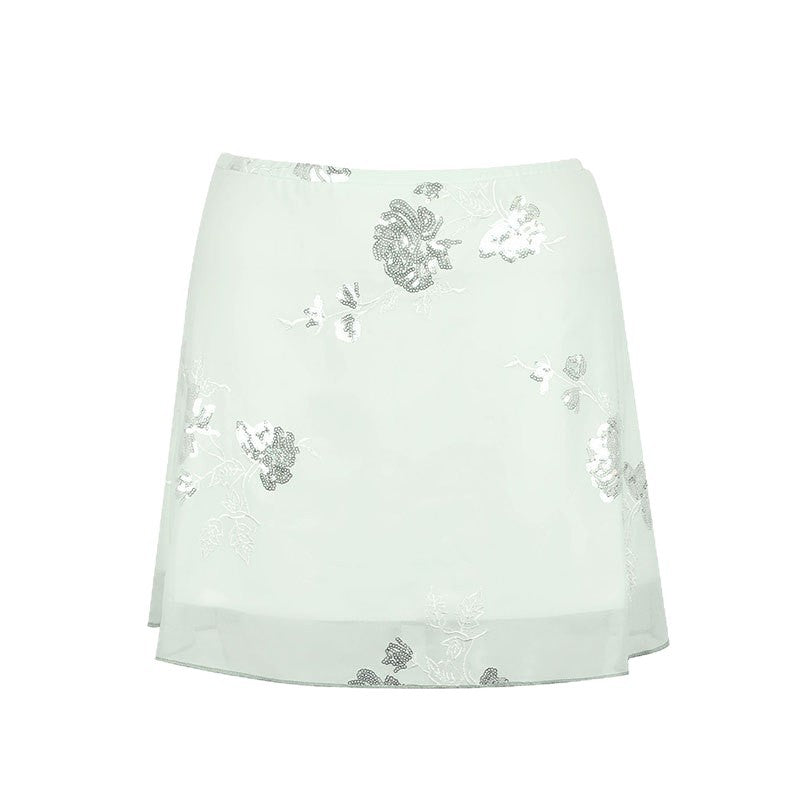 Dame gjennomsiktig skjørt med floralt design og glitrende detaljer Skjora