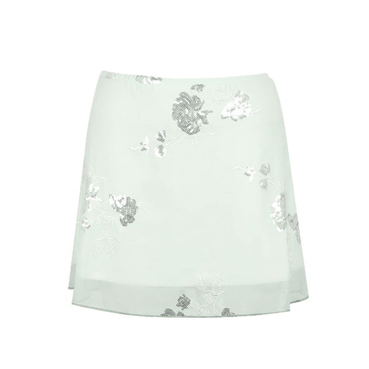 Dame gjennomsiktig skjørt med floralt design og glitrende detaljer Skjora