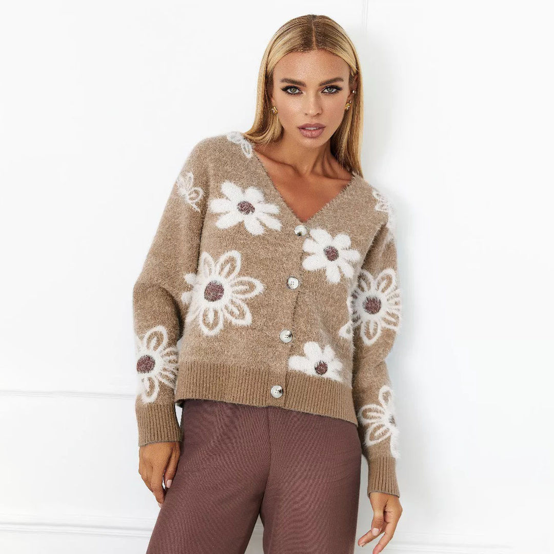 Kvinnens Koselige Cardigan med Blomster Mønster og Knappe Detaljer Skjora