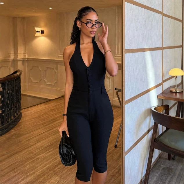 Dame jumpsuit med dyp V-hals og elegant knappdetalj Skjora