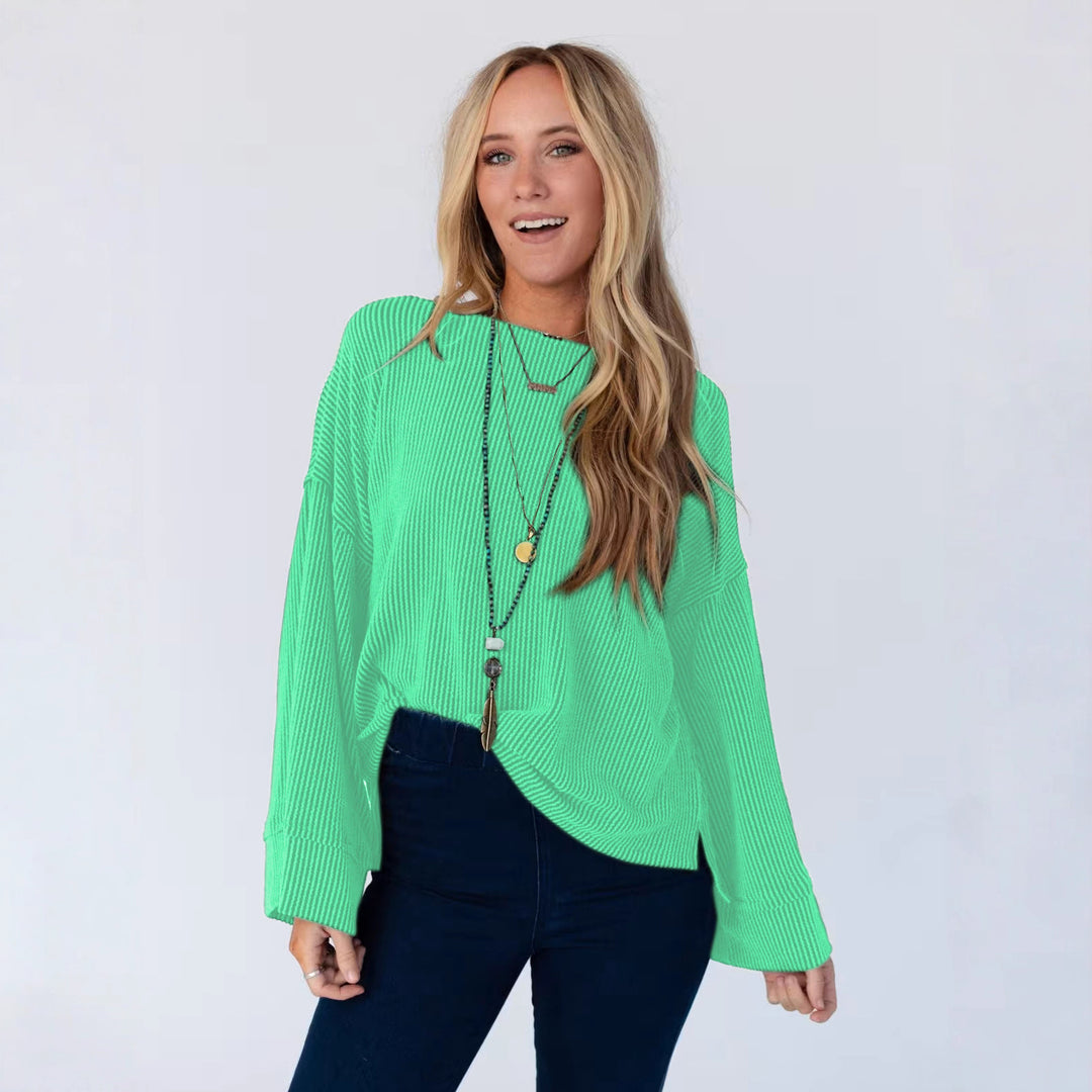 Topp for kvinner i casual stil med strukturert ribbestrikket mønster og brede vide ermer Skjora