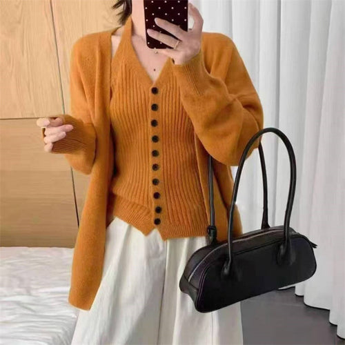 Kvinne chunky strikket cardigan med avtakbare ermer og knapp detaljer Skjora