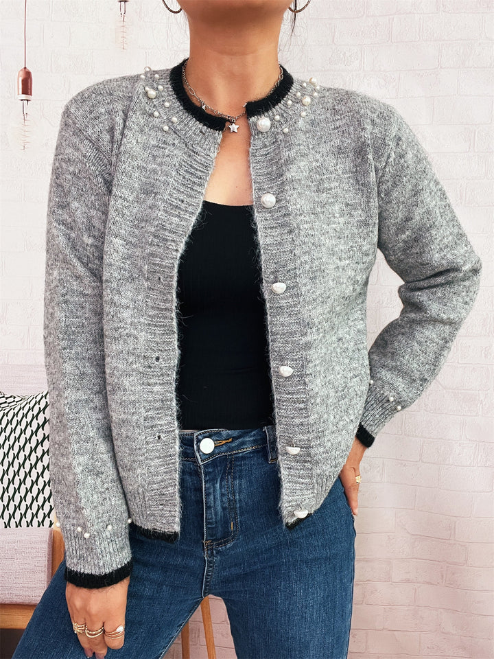 Dame elegant cardigan med dekorative knappe detaljer og perle utsmykkinger Skjora
