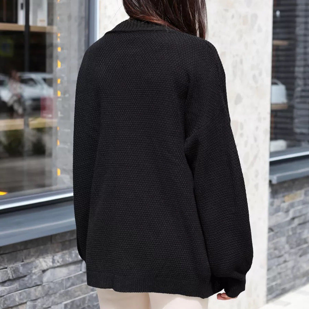 Kvinne oversized poncho med teksturert mønster og vide ermer Skjora