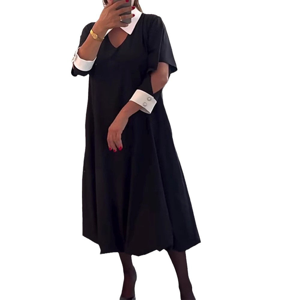 Kvinnes oversized skjortekjole med V-hals og elegant kragestruktur Skjora
