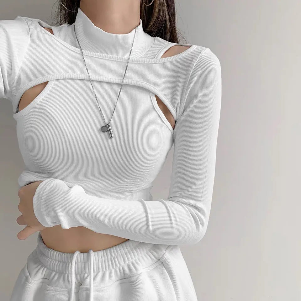 Dame trendy topp med cut-outs og høy krage Skjora