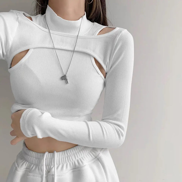 Dame trendy topp med cut-outs og høy krage Skjora